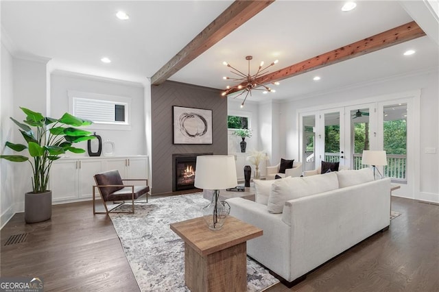 2602 Drew Valley Rd NE, Brookhaven, GA 30319 - living area with recessed lighting, beamed ceiling, wood finished floors, a fireplace, and french doors
