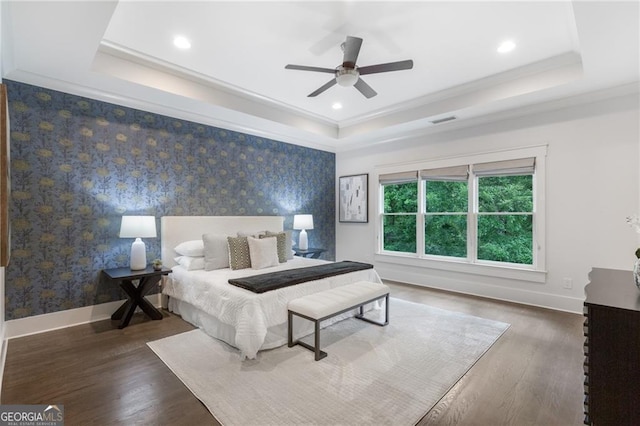 2602 Drew Valley Rd NE, Brookhaven, GA 30319 - bedroom with a raised ceiling, wallpapered walls, wood finished floors, crown molding, and recessed lighting
