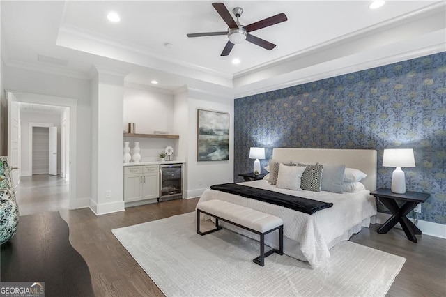 2602 Drew Valley Rd NE, Brookhaven, GA 30319 - bedroom with wine cooler, dark wood-style floors, a tray ceiling, wallpapered walls, and a bar