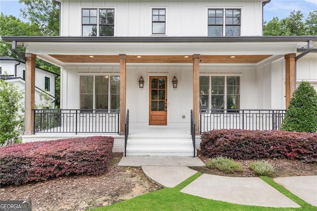 2602 Drew Valley Rd NE, Brookhaven, GA 30319 - doorway to property featuring board and batten siding and a porch