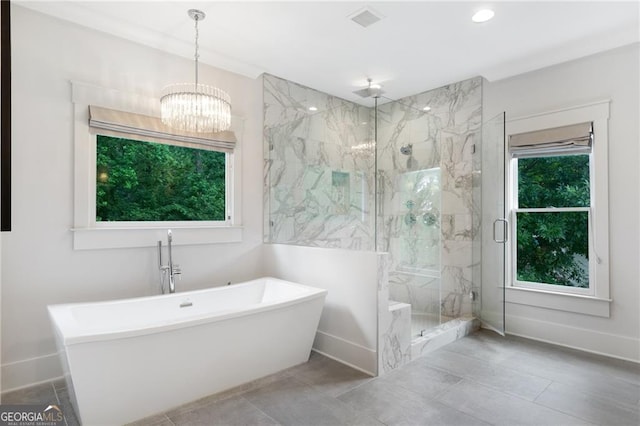 2602 Drew Valley Rd NE, Brookhaven, GA 30319 - bathroom with a chandelier, a marble finish shower, a freestanding bath, recessed lighting, and tile patterned flooring