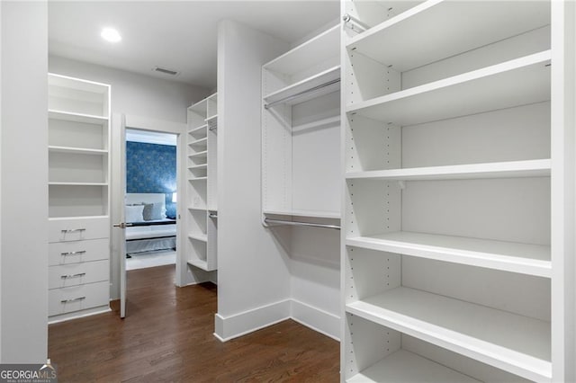 2602 Drew Valley Rd NE, Brookhaven, GA 30319 - spacious closet with dark wood-style flooring