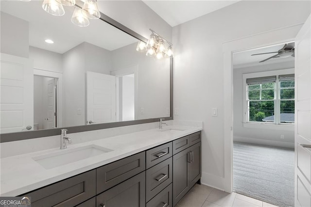 2602 Drew Valley Rd NE, Brookhaven, GA 30319 - bathroom with a chandelier, double vanity, tile patterned floors, and a ceiling fan