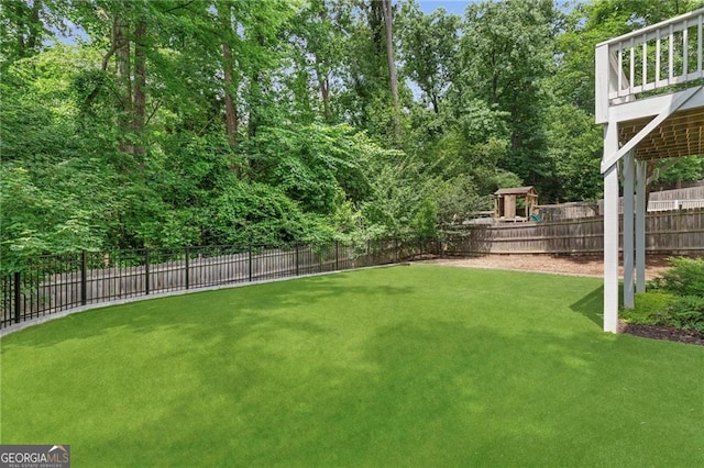 2602 Drew Valley Rd NE, Brookhaven, GA 30319 - fenced backyard with a playground