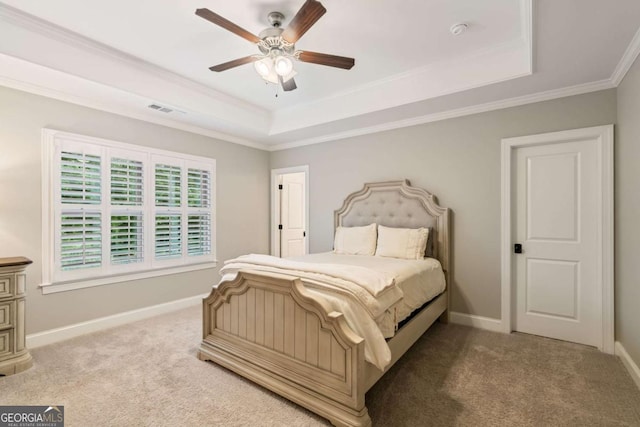2377 Kesgrove Way, Buford, GA 30518 - bedroom featuring a tray ceiling, carpet, ornamental molding, and ceiling fan