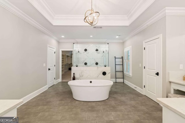 2377 Kesgrove Way, Buford, GA 30518 - bathroom with a shower stall, a tray ceiling, vanity, crown molding, and a chandelier