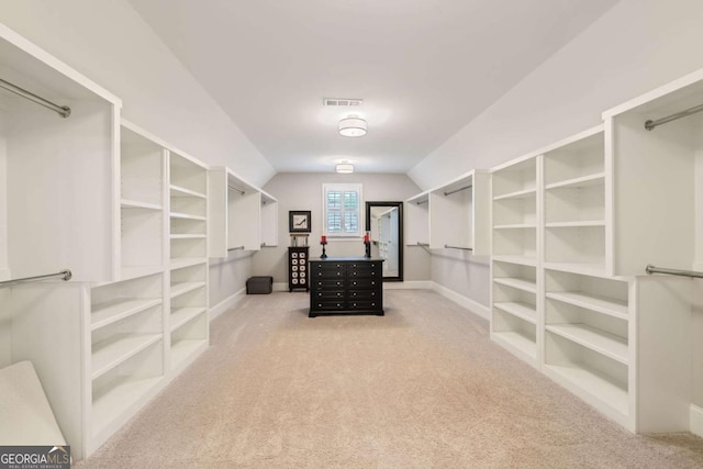 2377 Kesgrove Way, Buford, GA 30518 - spacious closet featuring carpet and vaulted ceiling