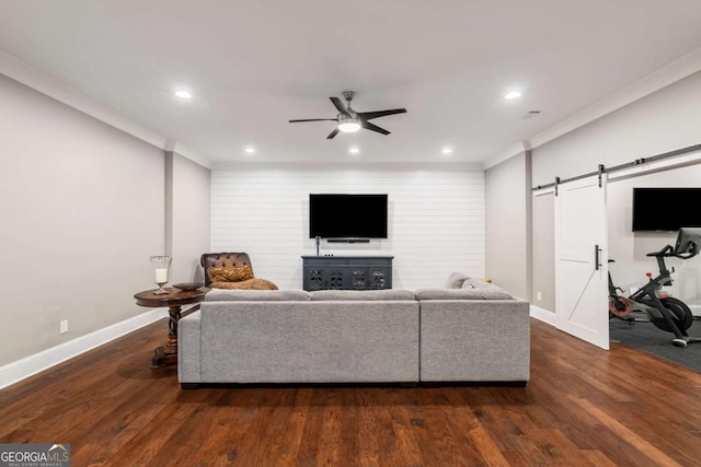 2377 Kesgrove Way, Buford, GA 30518 - living area featuring a barn door, recessed lighting, ceiling fan, wood finished floors, and crown molding