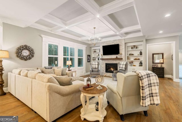 2377 Kesgrove Way, Buford, GA 30518 - living area with a fireplace, beam ceiling, a chandelier, recessed lighting, and light wood finished floors