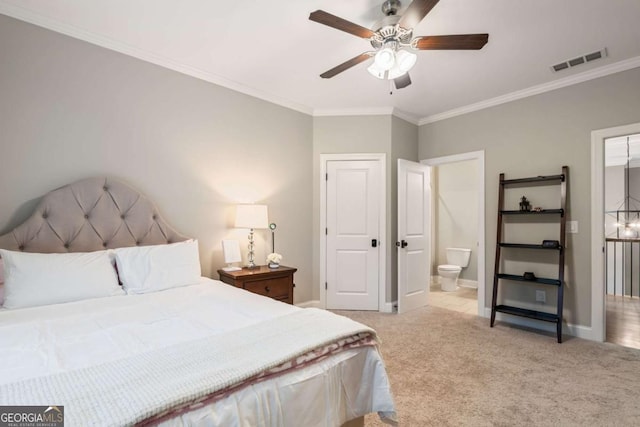 2377 Kesgrove Way, Buford, GA 30518 - carpeted bedroom with crown molding, ensuite bathroom, and ceiling fan