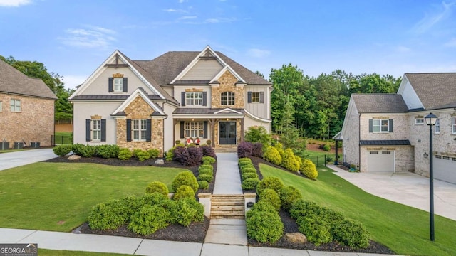 2377 Kesgrove Way, Buford, GA 30518 - craftsman-style house with a standing seam roof, a porch, driveway, stone siding, and a garage