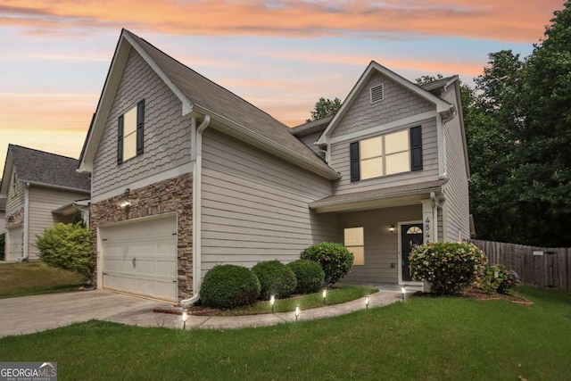 4546 Water Mill Dr, Buford, GA 30519 - view of front of home featuring a garage, concrete driveway, and stone siding