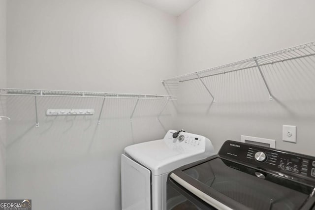 4546 Water Mill Dr, Buford, GA 30519 - laundry room featuring washer and clothes dryer