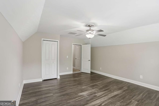 4546 Water Mill Dr, Buford, GA 30519 - additional living space with dark wood-style floors, lofted ceiling, and a ceiling fan