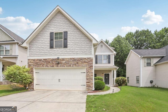 4546 Water Mill Dr, Buford, GA 30519 - view of front of home featuring stone siding, an attached garage, driveway, and a front lawn