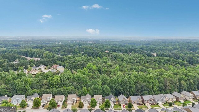 4546 Water Mill Dr, Buford, GA 30519 - aerial view of residential area featuring a heavily wooded area