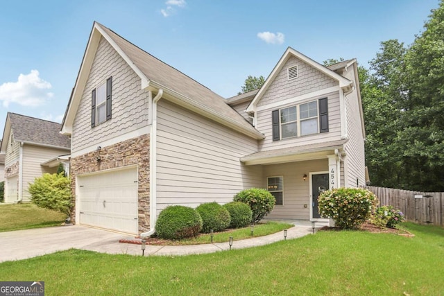4546 Water Mill Dr, Buford, GA 30519 - view of front of home with a garage, driveway, and stone siding