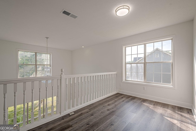 2576 Abbotts Glen Dr NW, Acworth, GA 30101 - spare room with wood finished floors and baseboards