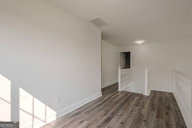 2576 Abbotts Glen Dr NW, Acworth, GA 30101 - spare room featuring wood finished floors and baseboards