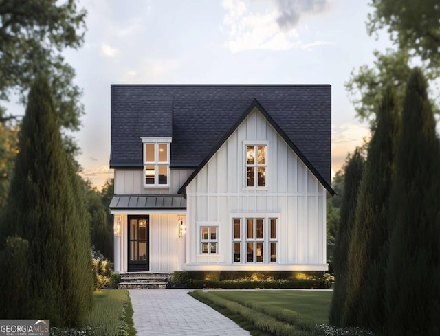 2885 Electric Ave, Watkinsville, GA 30677 - view of front of home featuring a standing seam roof, board and batten siding, roof with shingles, and metal roof