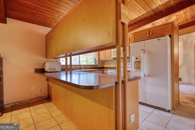 749 Dogwood Dr, Lawrenceville, GA 30046 - kitchen with white appliances, wooden ceiling with exposed beams, a sink, light tile patterned flooring, and a peninsula