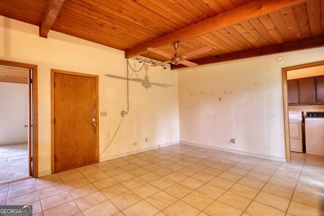749 Dogwood Dr, Lawrenceville, GA 30046 - empty room with wood ceiling with exposed beams, light tile patterned flooring, ceiling fan, and washing machine and clothes dryer