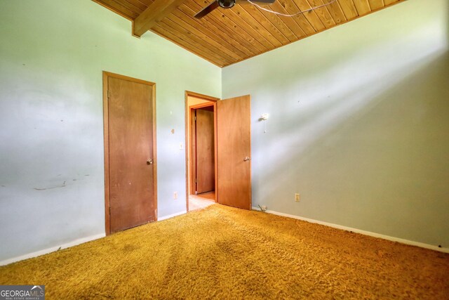 749 Dogwood Dr, Lawrenceville, GA 30046 - carpeted empty room featuring wood ceiling, a ceiling fan, and baseboards
