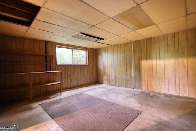 749 Dogwood Dr, Lawrenceville, GA 30046 - basement with wooden walls and a drop ceiling