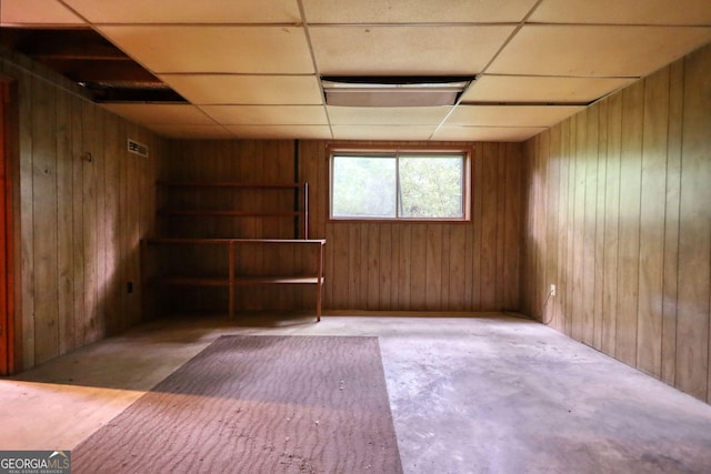749 Dogwood Dr, Lawrenceville, GA 30046 - basement featuring wood walls and a drop ceiling