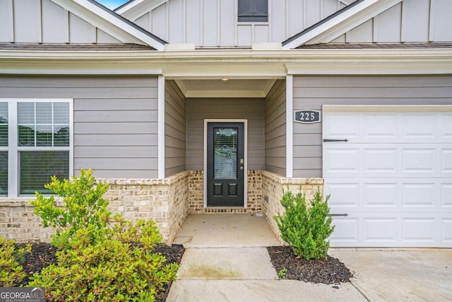 225 Limestone Cir, Conyers, GA 30013 - entrance to property featuring board and batten siding and brick siding