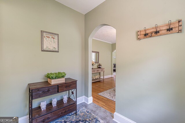1391 Jefferson Ave, East Point, GA 30344 - corridor featuring arched walkways, tile patterned floors, baseboards, and ornamental molding