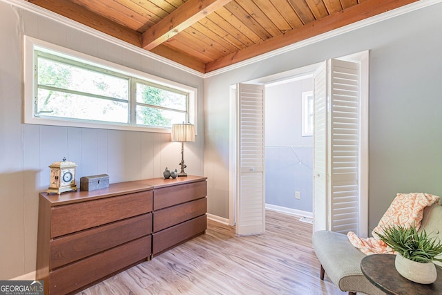 1391 Jefferson Ave, East Point, GA 30344 - living area featuring wood ceiling with exposed beams, light wood-style floors, and baseboards