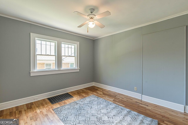 1391 Jefferson Ave, East Point, GA 30344 - unfurnished room featuring wood finished floors, ceiling fan, baseboards, and ornamental molding