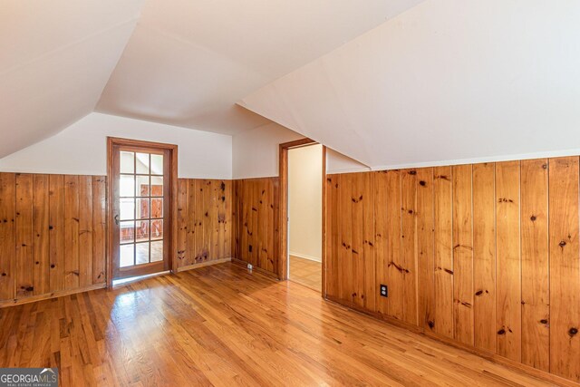 1391 Jefferson Ave, East Point, GA 30344 - bonus room featuring vaulted ceiling, wood finished floors, wood walls, and wainscoting