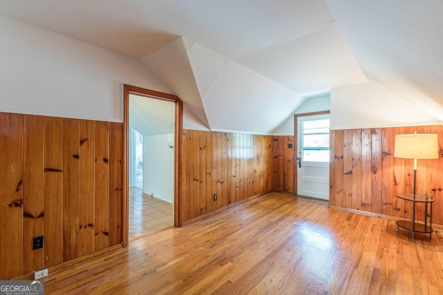 1391 Jefferson Ave, East Point, GA 30344 - bonus room with wooden walls, wood finished floors, and vaulted ceiling