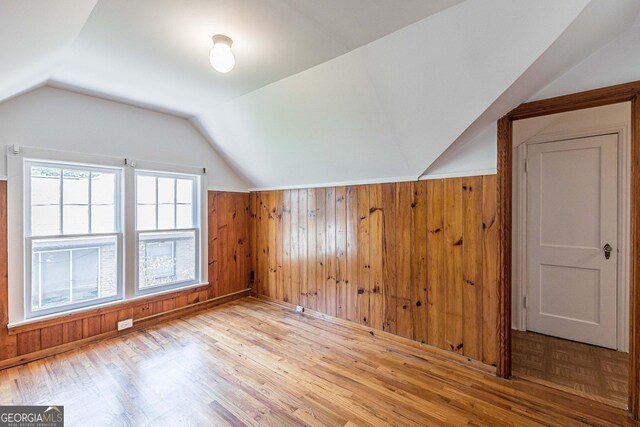 1391 Jefferson Ave, East Point, GA 30344 - additional living space with wood walls, lofted ceiling, and wood finished floors