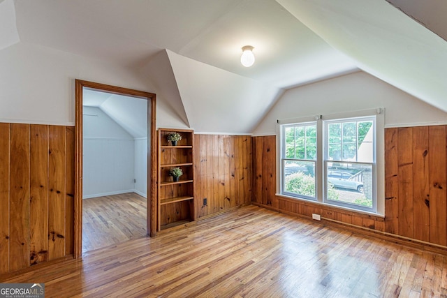 1391 Jefferson Ave, East Point, GA 30344 - bonus room featuring wooden walls, wood finished floors, vaulted ceiling, and wainscoting