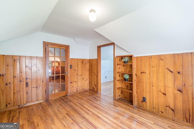1391 Jefferson Ave, East Point, GA 30344 - additional living space featuring vaulted ceiling, wood finished floors, a wainscoted wall, and wooden walls