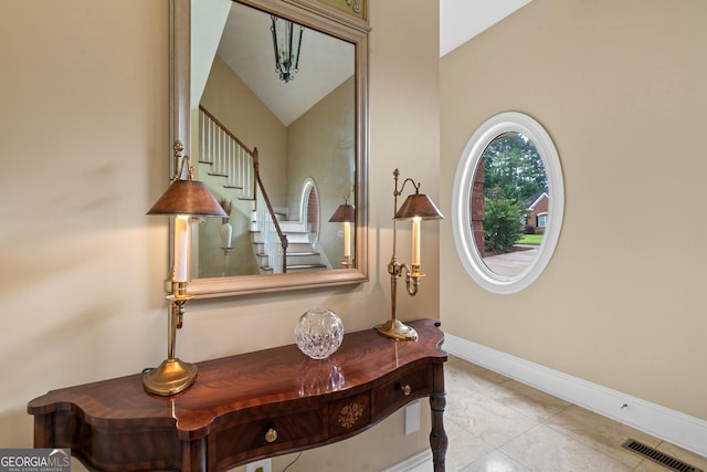 100 S Haven Ct, Macon, GA 31210 - tiled foyer featuring stairs and baseboards