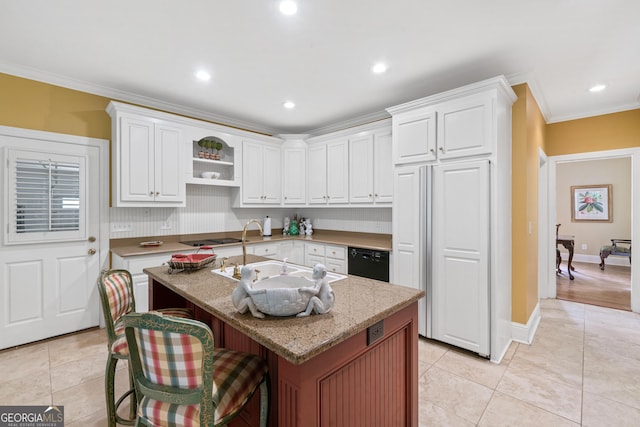 100 S Haven Ct, Macon, GA 31210 - kitchen with dishwasher, white cabinets, ornamental molding, light tile patterned floors, and a sink
