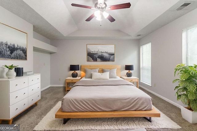 2191 Phillips Rd, Lithonia, GA 30058 - bedroom with carpet flooring, a raised ceiling, baseboards, and a ceiling fan