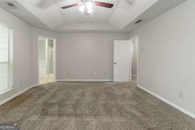 2191 Phillips Rd, Lithonia, GA 30058 - empty room featuring ceiling fan, carpet flooring, baseboards, and lofted ceiling