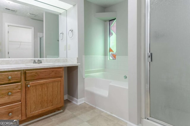 2191 Phillips Rd, Lithonia, GA 30058 - bathroom featuring vanity, a stall shower, a bath, and baseboards