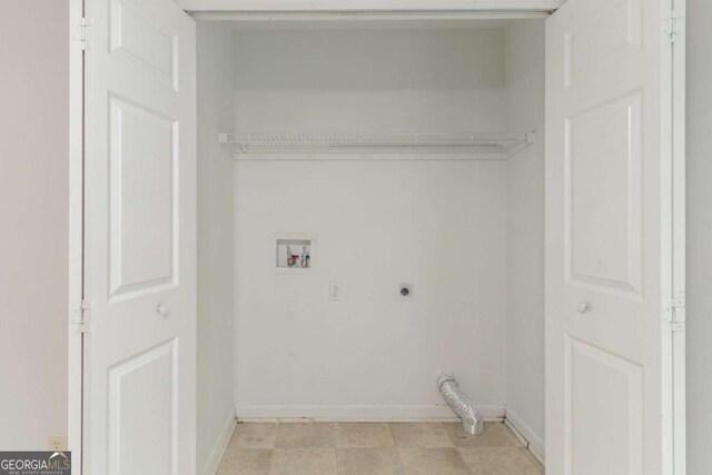 2191 Phillips Rd, Lithonia, GA 30058 - laundry room featuring electric dryer hookup, hookup for a washing machine, and baseboards