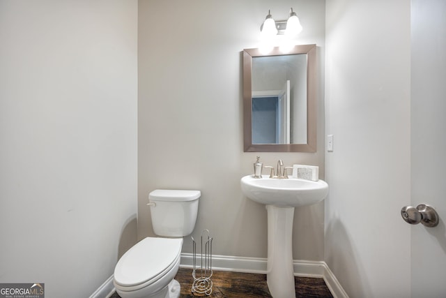4202 Morrison Way Unit 9, Atlanta, GA 30341 - half bath featuring toilet, baseboards, wood finished floors, and a sink