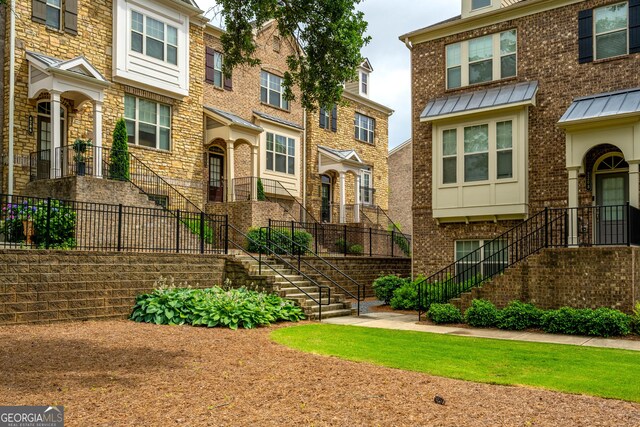 4202 Morrison Way Unit 9, Atlanta, GA 30341 - view of front of house featuring stairs and brick siding