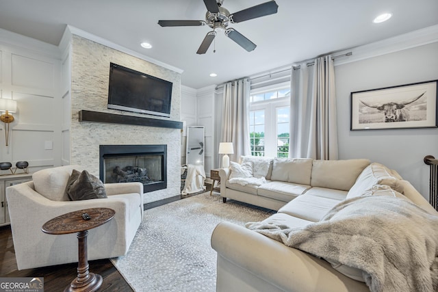 4202 Morrison Way Unit 9, Atlanta, GA 30341 - living room featuring ornamental molding, a ceiling fan, a stone fireplace, recessed lighting, and dark wood-style flooring