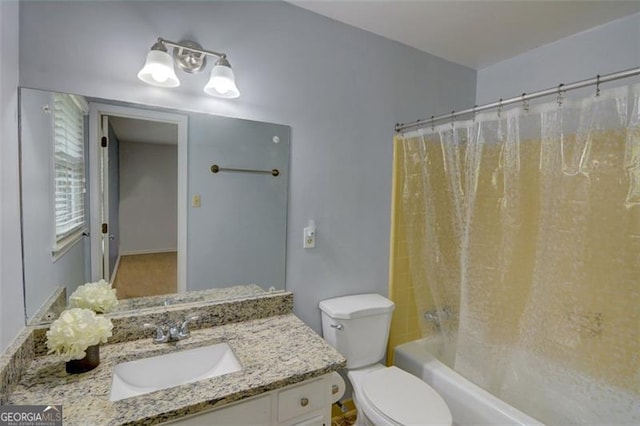 2808 Peeler Rd, Dunwoody, GA 30360 - full bathroom featuring vanity, toilet, and shower / bath combination with curtain