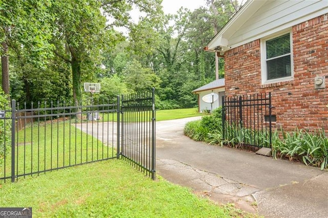 2808 Peeler Rd, Dunwoody, GA 30360 - gate featuring view of scattered trees