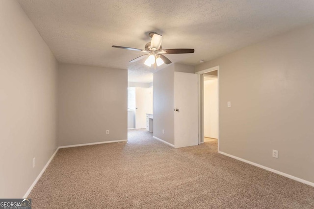 5092 Stone Trce, Stone Mountain, GA 30083 - carpeted empty room with ceiling fan, a textured ceiling, and baseboards